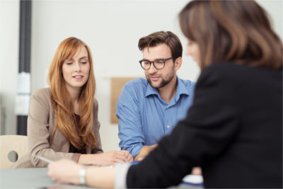 A couple getting credit counselling help to review options to get out of debt.