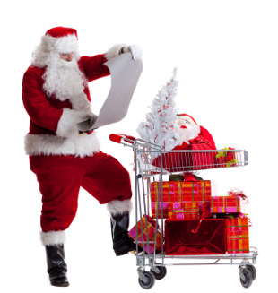 Santa Claus shopping at the store with a shopping cart for Christmas presents using a list which represents good holiday planning and budgeting.