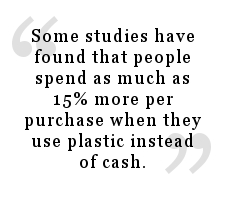 Quote about how people spend more money when they use credit cards rather than cash.